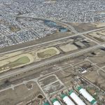 Earthworks for future stormwater ponds near the intersection of James Mckevitt/Tournament Lane and Highway 22X (looking northeast)