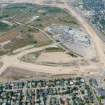 Building the base for Grey Eagle Boulevard adjacent to 37 Street and south of Glenmore Trail (looking west)