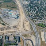 The detour ramp from northbound Grey Eagle Boulevard to eastbound Glenmore Trail, as well as earthworks to build new lanes along Glenmore Trail (looking west)