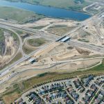 Bridges taking shape and earthworks to build the approaches at the Macleod Trail interchange (looking southwest)