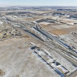 View of the of the south gravel site and intersection of Highway 22X and 37 Street (looking southeast)