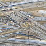 Demolition of the old Highway 22X bridge spanning Macleod Trail and placing girders on the new bridge from eastbound Highway 22X to northbound Macleod Trail (looking northeast)