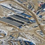 Three bridges with girders, as well as the piers for a fourth bridge in the Sarcee Trail Interchange (looking northwest)