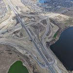 Eastbound and westbound traffic realigned onto the future westbound SWCRR at Macleod Trail, with the old portion of Highway 22X being milled out (looking southeast)