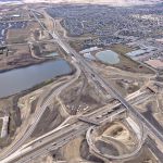 Bridges under construction at Macleod Trail, with the Highway 22X corridor in the background (looking northwest)