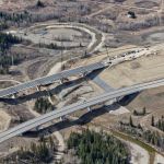 New bridge taking shape at Fish Creek, with the river realignment and bioengineering shown in the background (looking west)