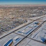 Looking northeast at James McKevitt Road / Spruce Meadows Way