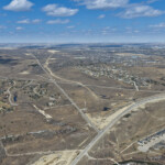 The KGL haul road and the future alignment of the West Calgary Ring Road near 101 Street and Highway 8 (looking north)