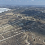 The SWCRR alignment for 90 Avenue, Southland drive and the north-south mainline (looking east)