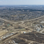 The SWCRR alignment down the west side of Woodbine, with the KGL site office and Tsuut'ina Nation Admin Building (looking southeast)
