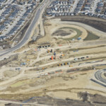 Construction for the Fish Creek Boulevard bridge spanning the SWCRR and connecting to 37 Street (looking east)