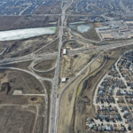 Earthworks and bridge construction at Highway 22X and Macleod Trail (looking west)