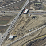 Earthworks and bridge construction for the future westbound alignment at Highway 22X and Macleod Trail (looking west)