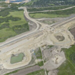 A stormwater pond taking shape near the interchange for 90 Avenue (looking east)