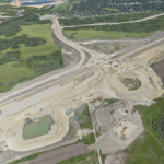 A stormwater pond taking shape near the interchange for 90 Avenue (looking east)