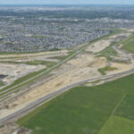 Earthworks for new lanes and bridge construction in the median of Highway 22X (looking east)