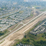 Earthworks near 69 Street and Discovery Ridge Boulevard, including work to remove the east portion of Lower Springbank Road (looking east)
