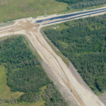 Curb and gutters taking shape before paving at the intersection of 90 Avenue and Southland Drive (looking north)