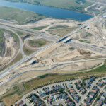 Bridges taking shape and earthworks to build the approaches at the Macleod Trail interchange (looking southwest)