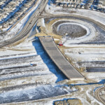 The approaches to the new bridge showing the future alignment of Fish Creek Boulevard (looking east)