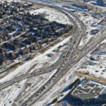 View of the traffic realignment at Highway 8, Sarcee Trail and Glenmore Trail, which freed up construction areas further to the south (looking southeast)