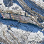 The new bridge providing access from eastbound Highway 8 to eastbound Glenmore Trail and northbound Sarcee Trail (looking southeast)
