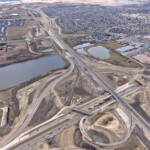 Bridges under construction at Macleod Trail, with the Highway 22X corridor in the background (looking northwest)