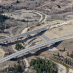 New bridge taking shape at Fish Creek, with the river realignment and bioengineering shown in the background (looking west)