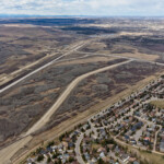 Construction by the City of Calgary to build the connections at 90 Avenue and Southland Drive (looking northwest)